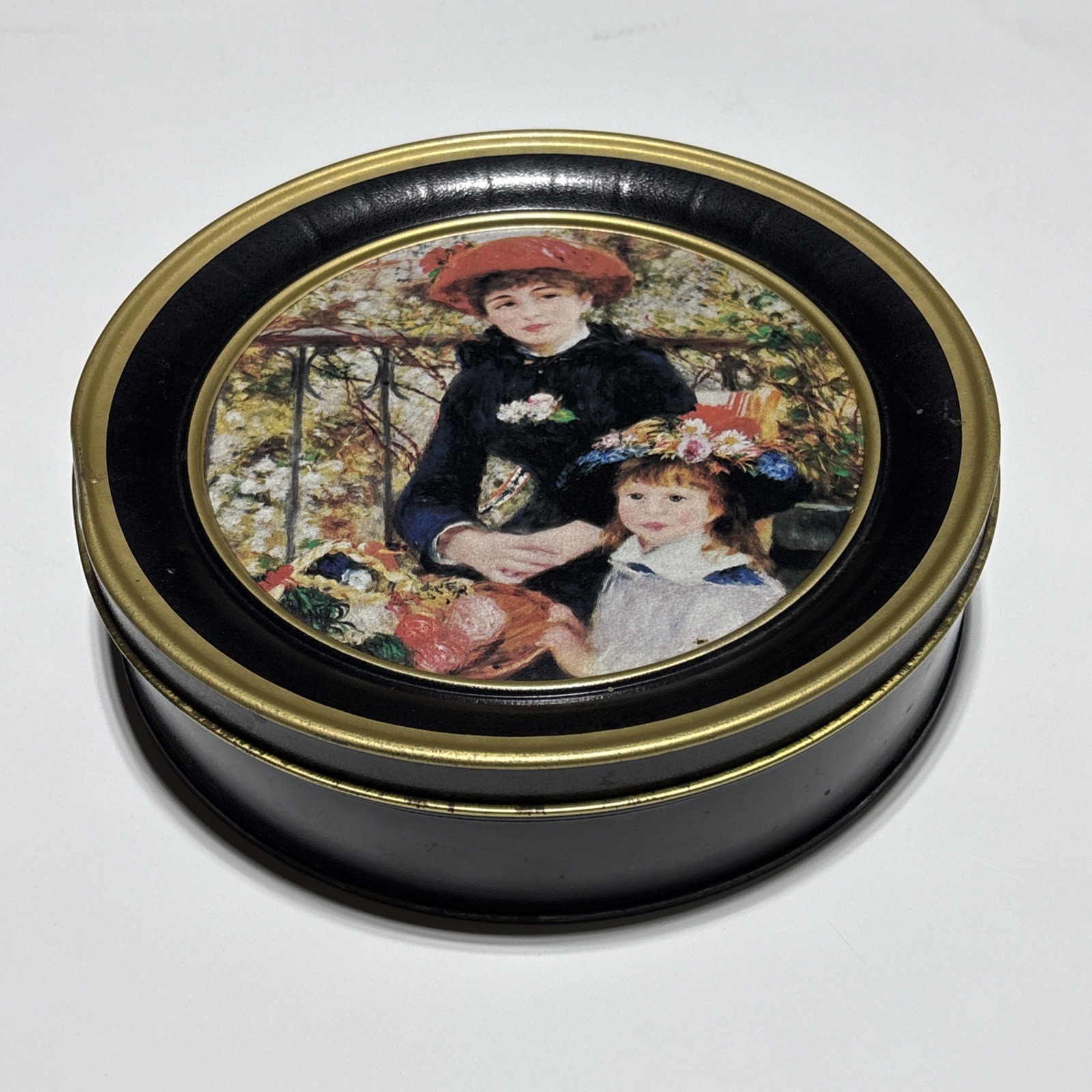 Vintage 1980’s – 90’s ~ Swiss Colony Cookie Tin ~ Renoir’s “On The Terrace”