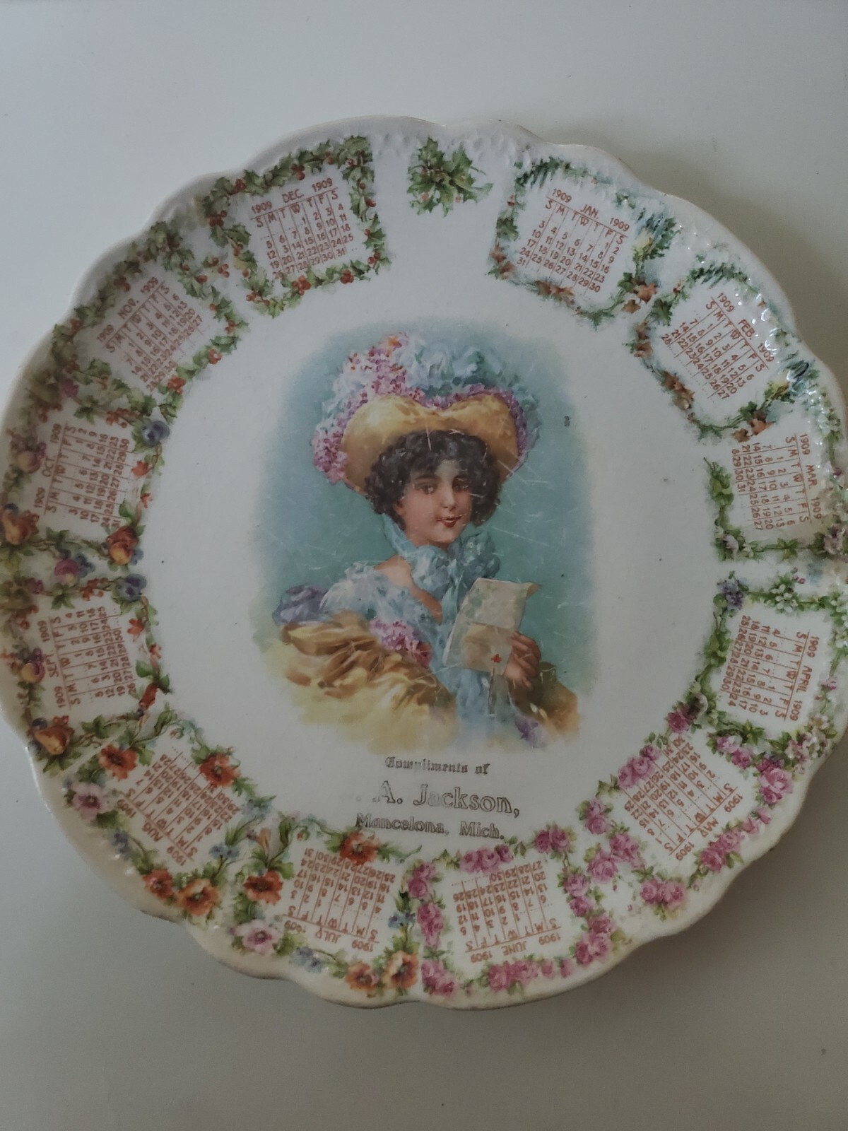 Antique 1909 Advertising Calendar Plate Gibson Girl Mancelona, MI 8 inches.