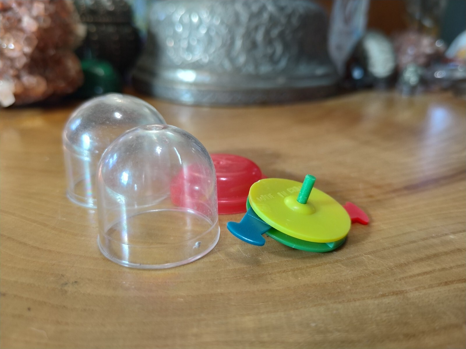 Vintage 1970s plastic gumball machine toy with “egg”. Spinning top