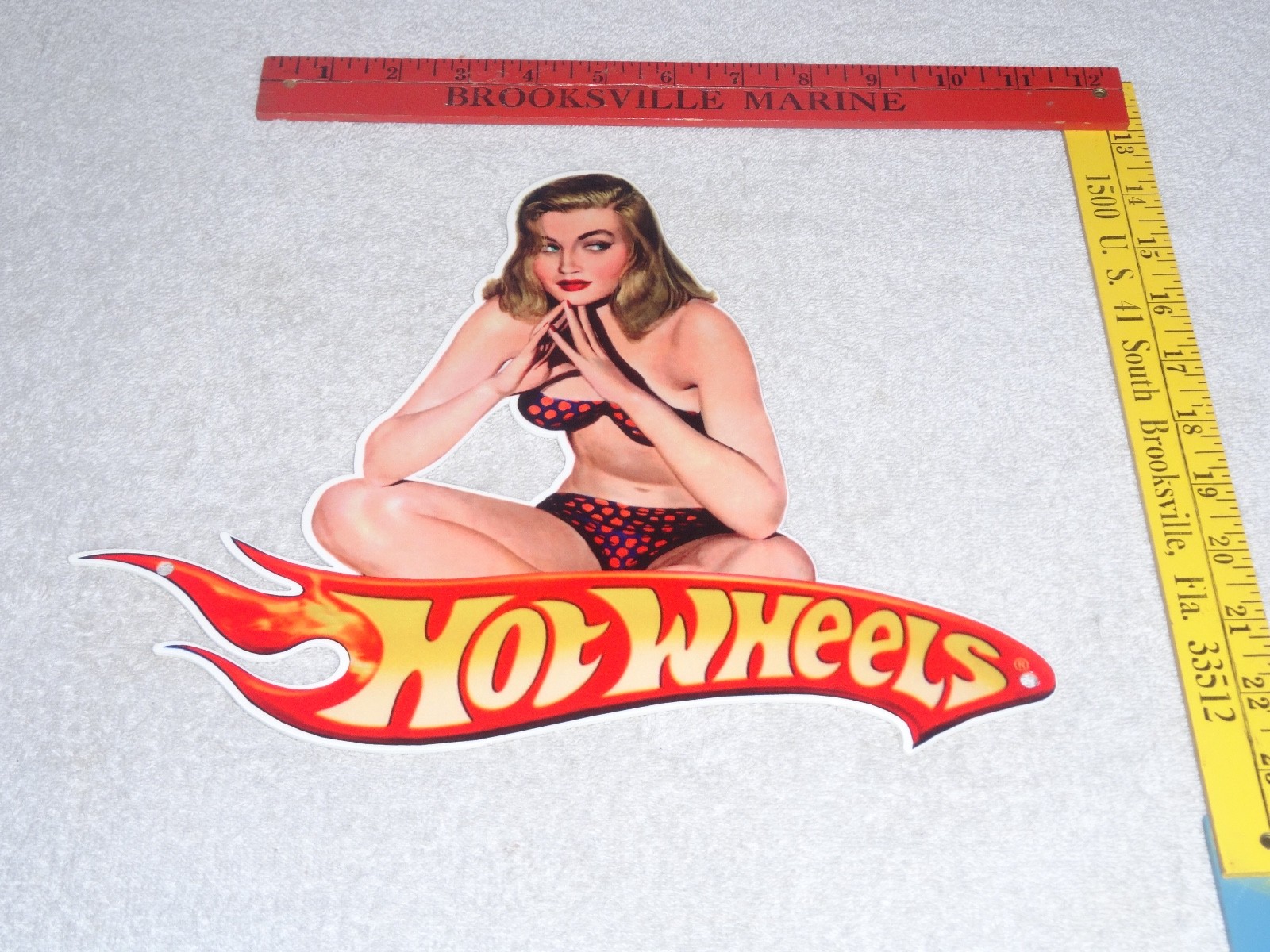 VINTAGE HOT WHEELS WOMAN 👩 12″ METAL 🏎️ RACE CAR GASOLINE OIL ADVERTISING SIGN