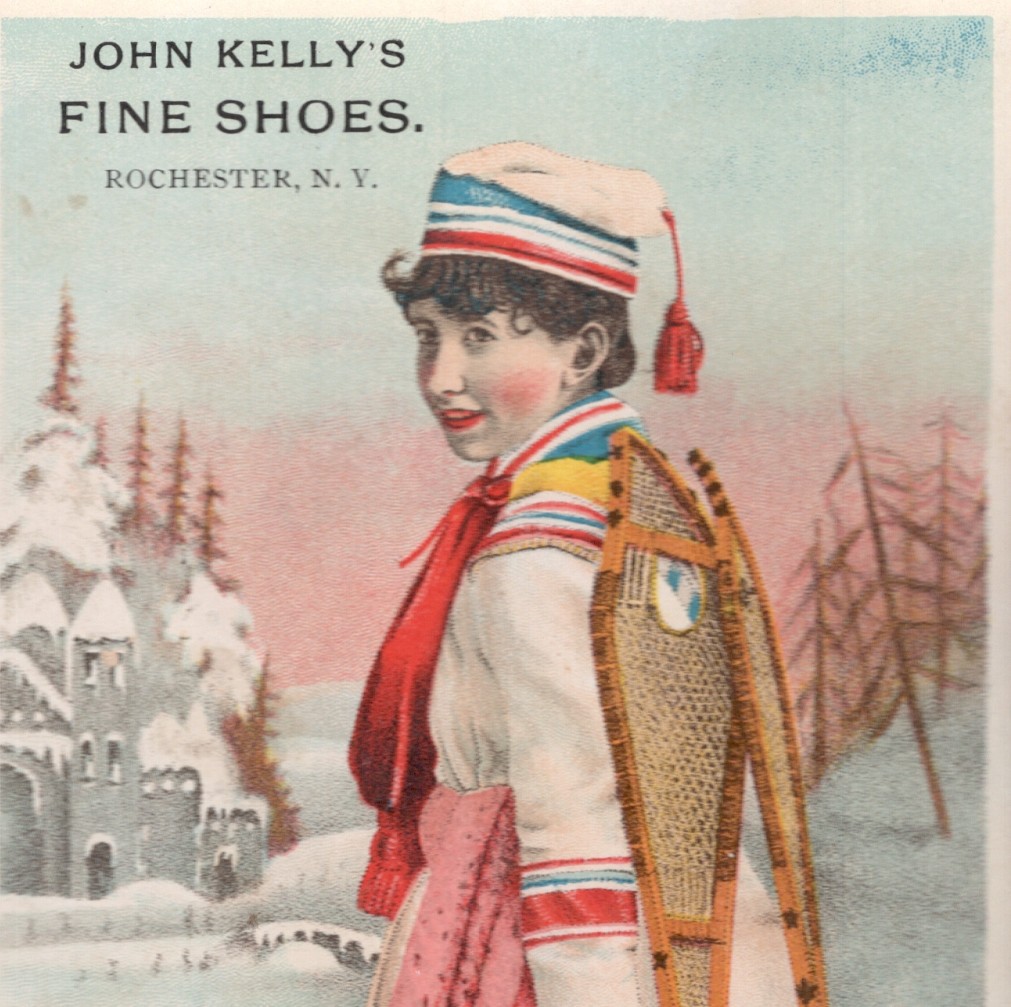 ROCHESTER NY TRADE CARD, JOHN KELLY’S SHOES, LADY with ANTIQUE SNOW SHOE C431*