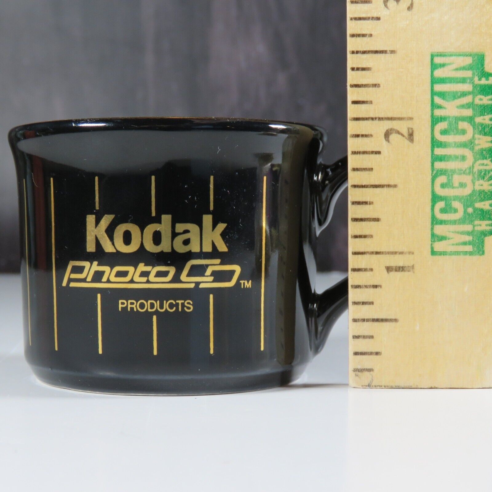 Kodak Photo Co. Paper Clip Holder Small Mug Cup Gold Black RARE Advertisement