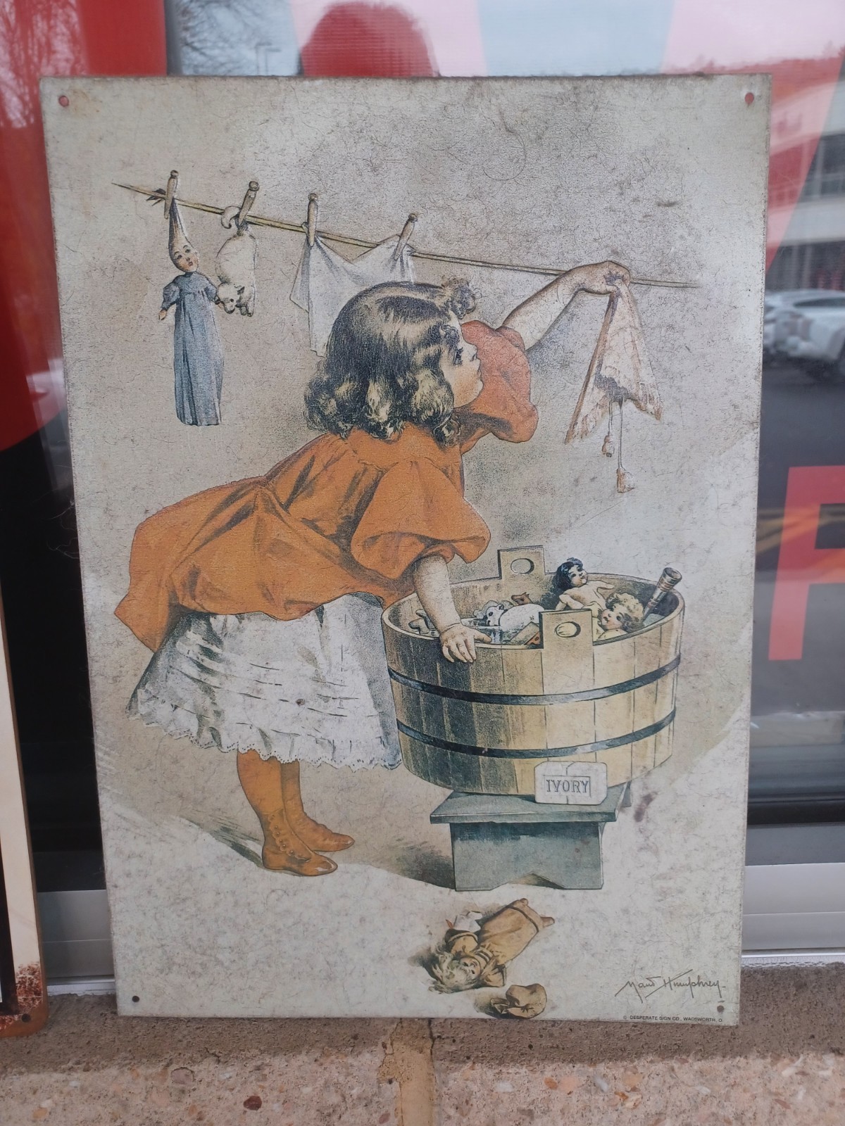 Ivory Soap Little Girl Washing Doll Clothes “A Busy Day” Tin Sign, Maud Humphrey