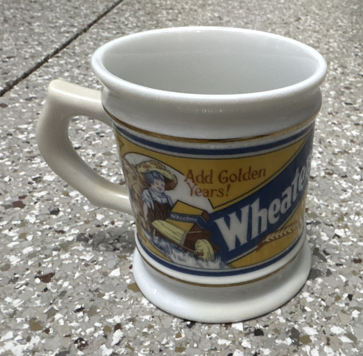 Wheatena Corner Store Porcelain Advertising Mug Collection – White Yellow Blue