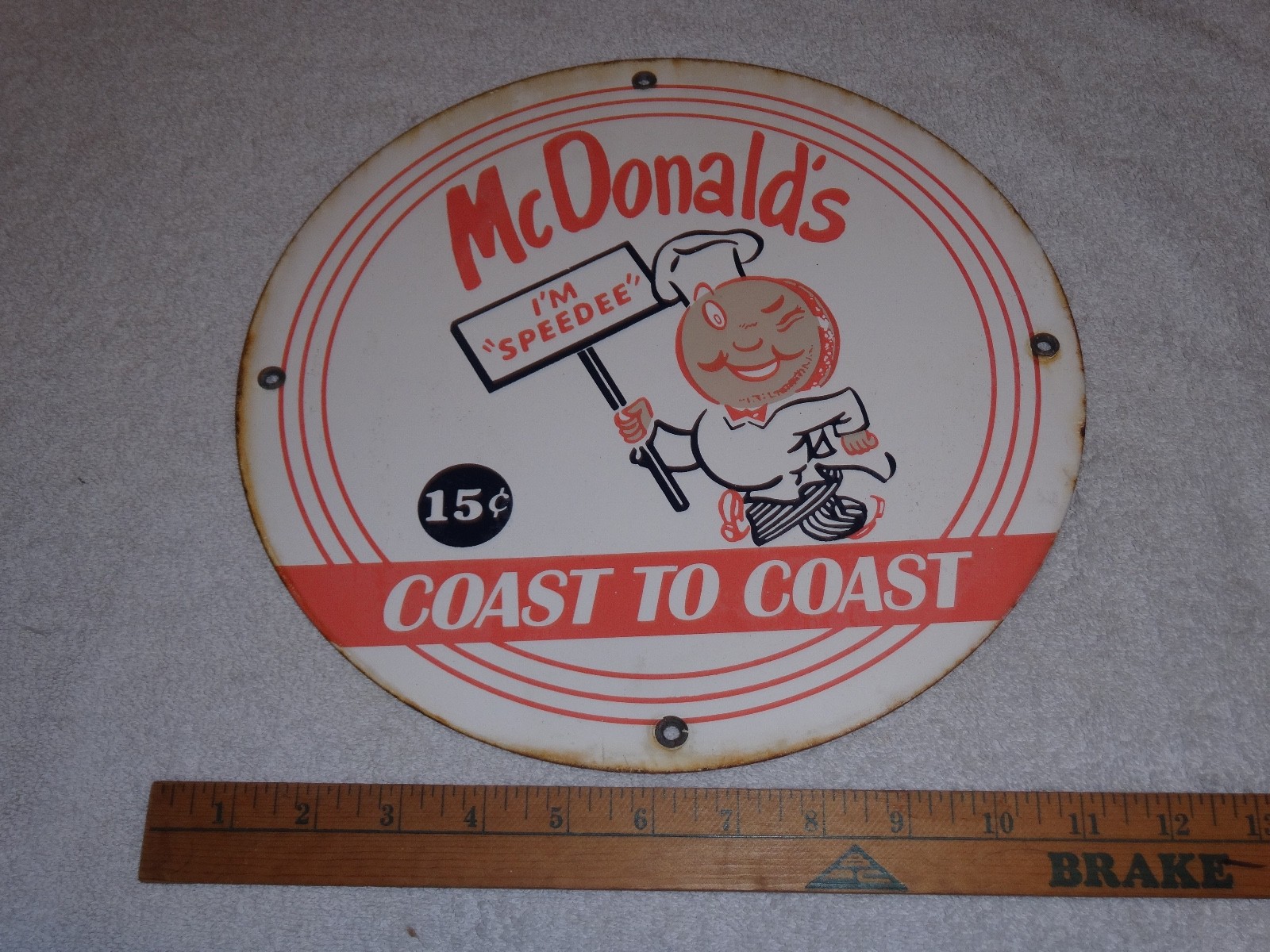 VINTAGE ORIGINAL GROMMETS MCDONALD’S FAST FOOD RESTAURANT 11 3/4″ PORCELAIN SIGN