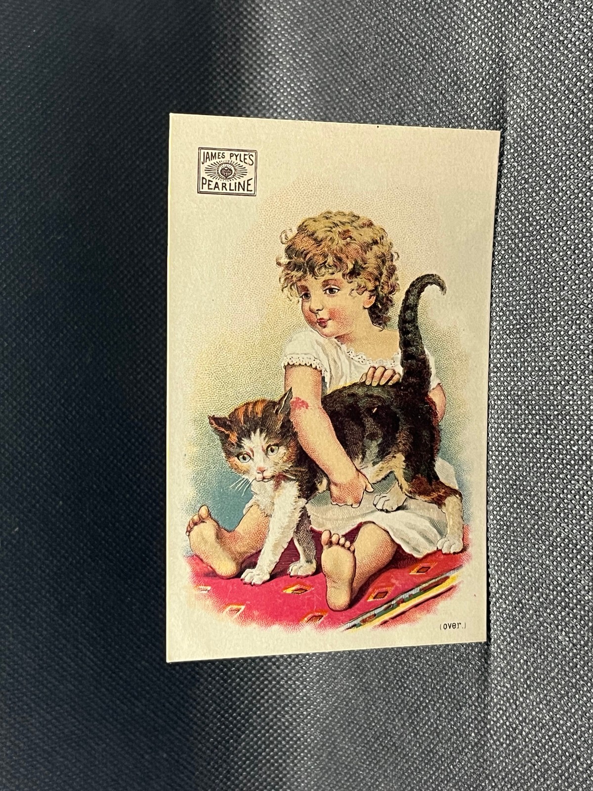 TRADE CARD JAMES PYLE’S PEARLINE WASHING COMPOUND GIRL WITH A CAT