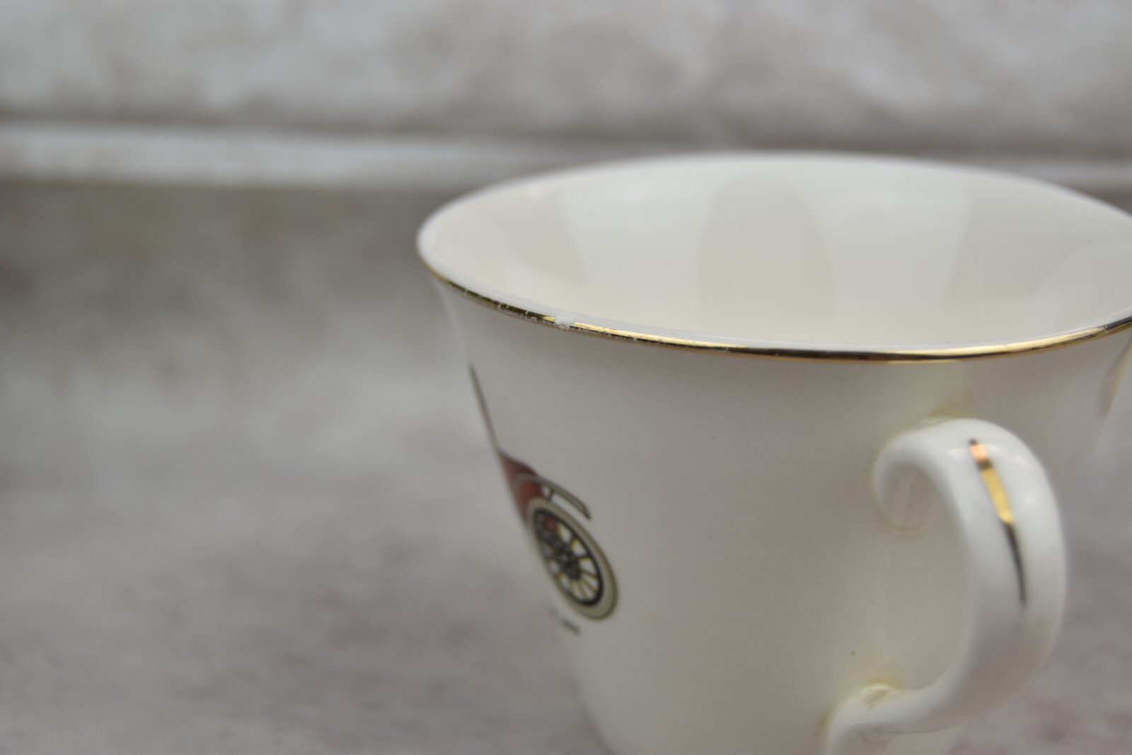 Vintage Oldsmobile Runabout red car Tea cup Gold rim small chip on the rim