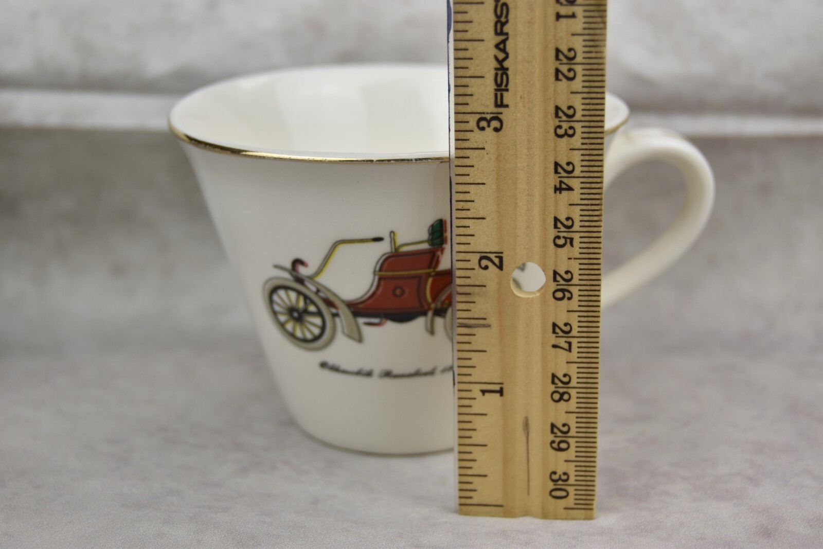 Vintage Oldsmobile Runabout red car Tea cup Gold rim small chip on the rim