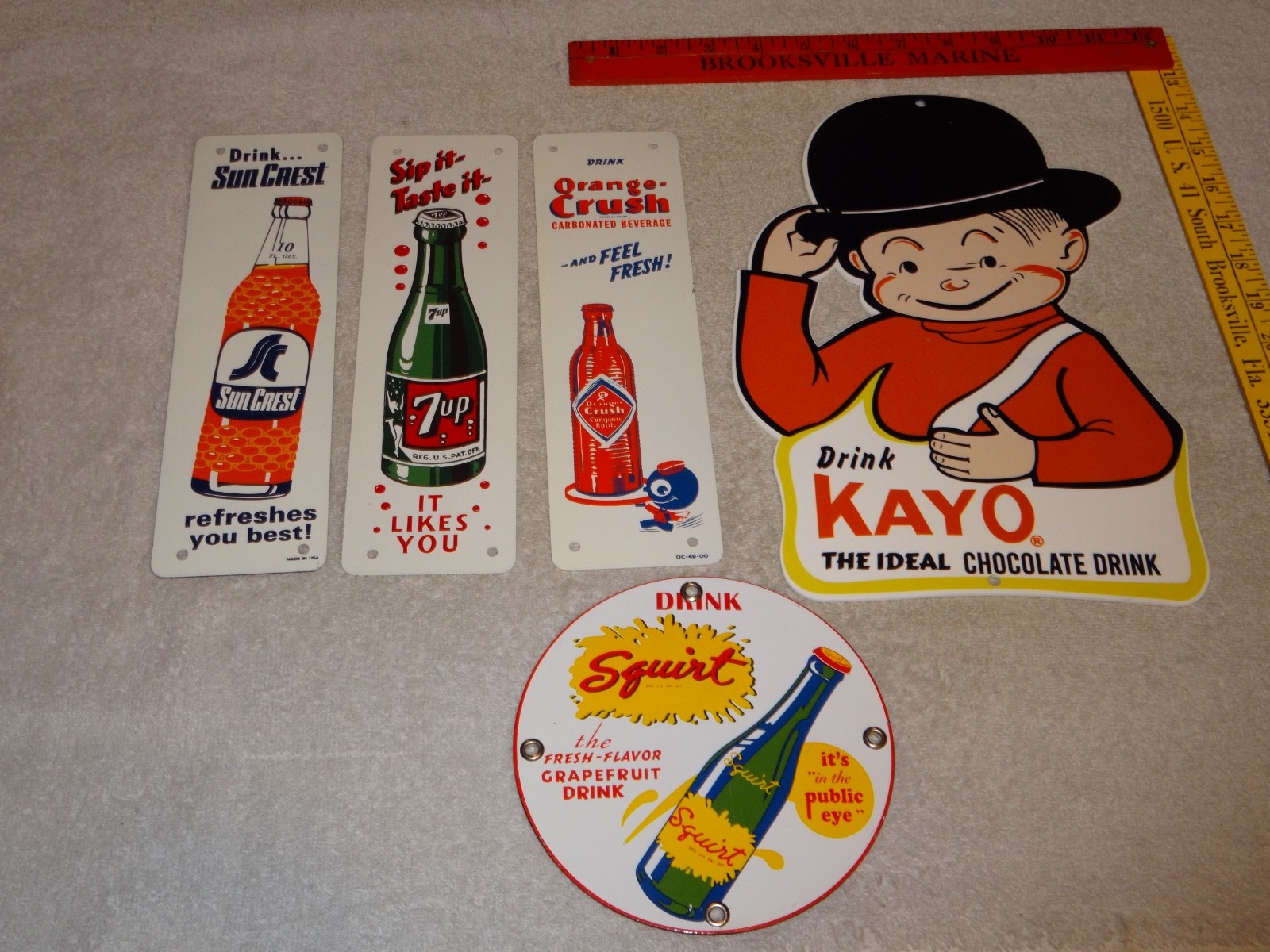 VINTAGE SODA COLLECTION OF 5 METAL & PORCELAIN SIGN ORANGE CRUSH 7UP SQUIRT KAYO