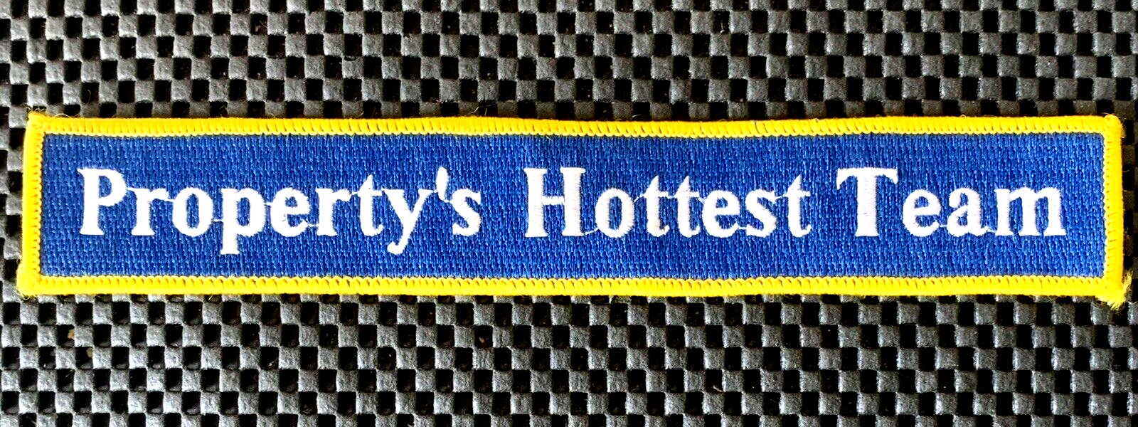 PROPERTY’S HOTTEST TEAM EMBROIDERED SEW ON ONLY PATCH REAL ESTATE 8 3/4 x 1 1/2″
