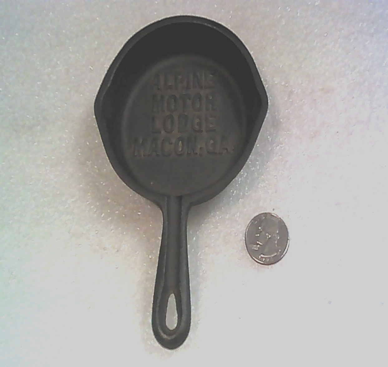MINI CAST IRON ADVERTISING FRY PAN FROM ALPINE MOTOR LODGE MACON, GA.