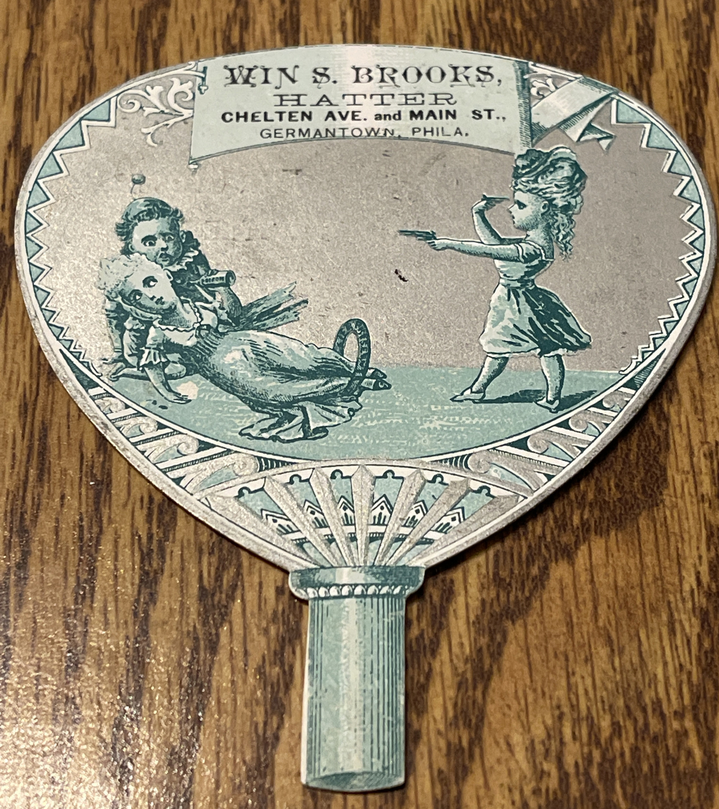 Vintage ~ WIN S. Brooks ~ MAD HATTER ~ TRADE CARD ~ FAN ~ PISTOLS ~ RARE