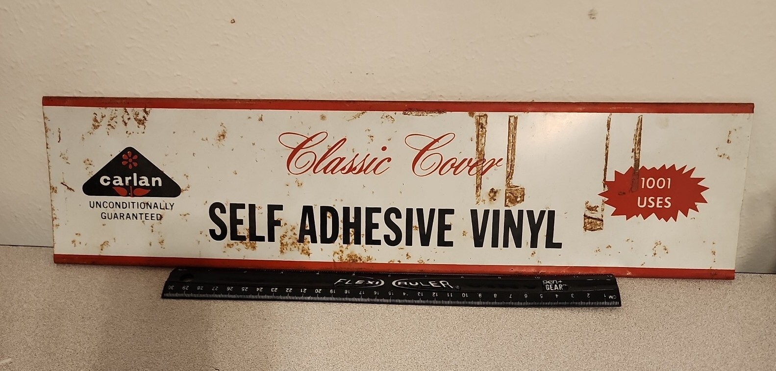 Vtg 1970s CARLAN CLASSIC COVER SELF ADHESIVE VINYL Advertising Metal Tin Sign