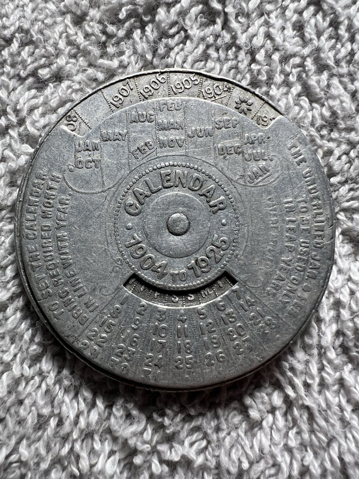 Antique 1925 “U.S. Metallic Packing Co.” Aluminum Perpetual Calendar Token