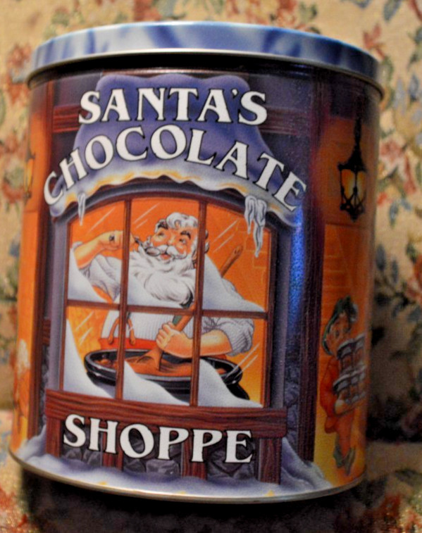 Vintage Santa’s Chocolate Shoppe Round Christmas Tin 6-1/2″ x 7-1/4″ Tall EMPTY
