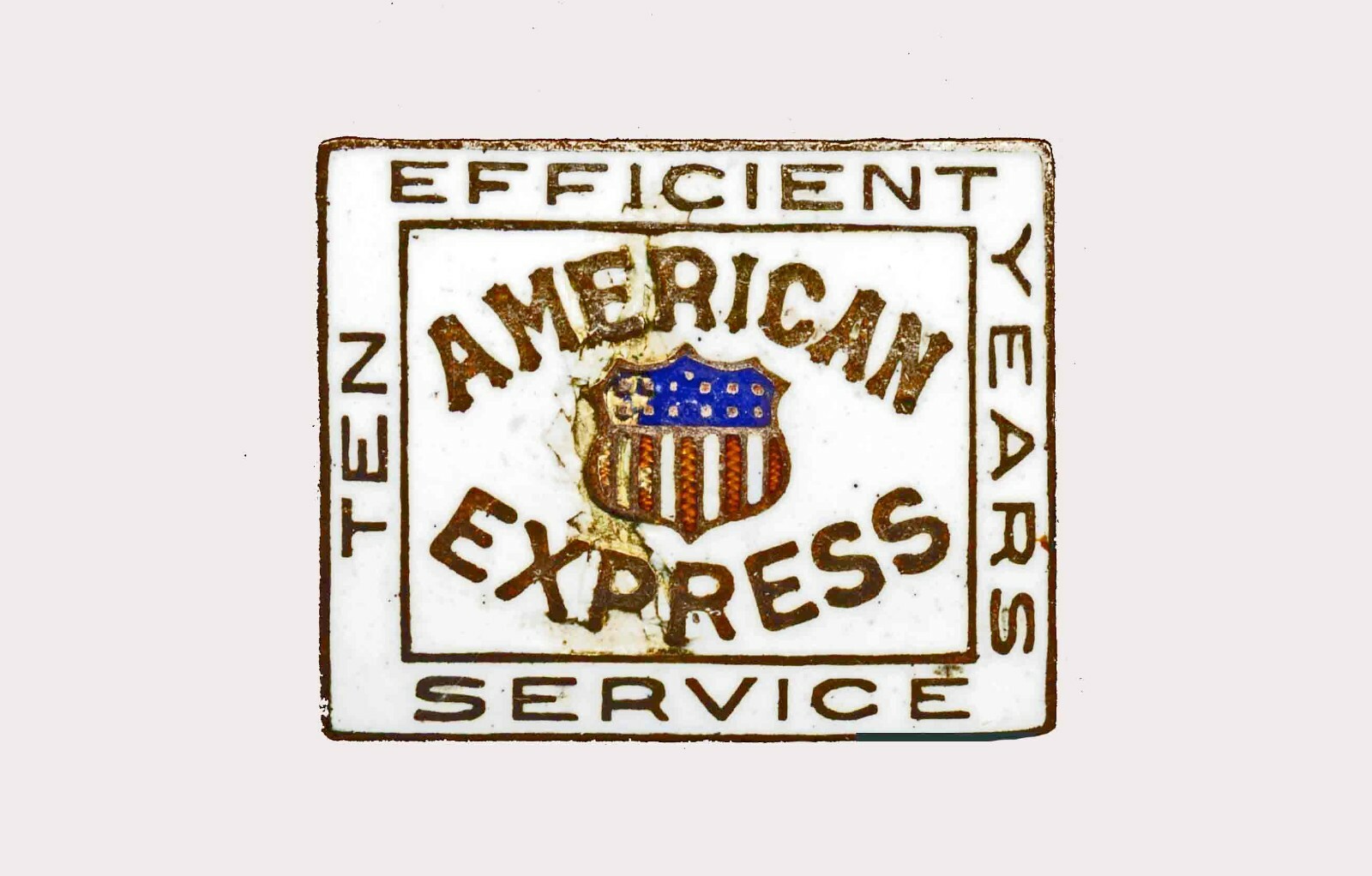 c1890-1920 AMERICAN EXPRESS “Ten Year Efficient Service” PIN/Porcelain on Copper